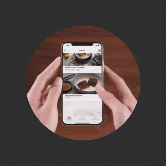 rotating gif image of someone using the hestan cue app on their mobile device