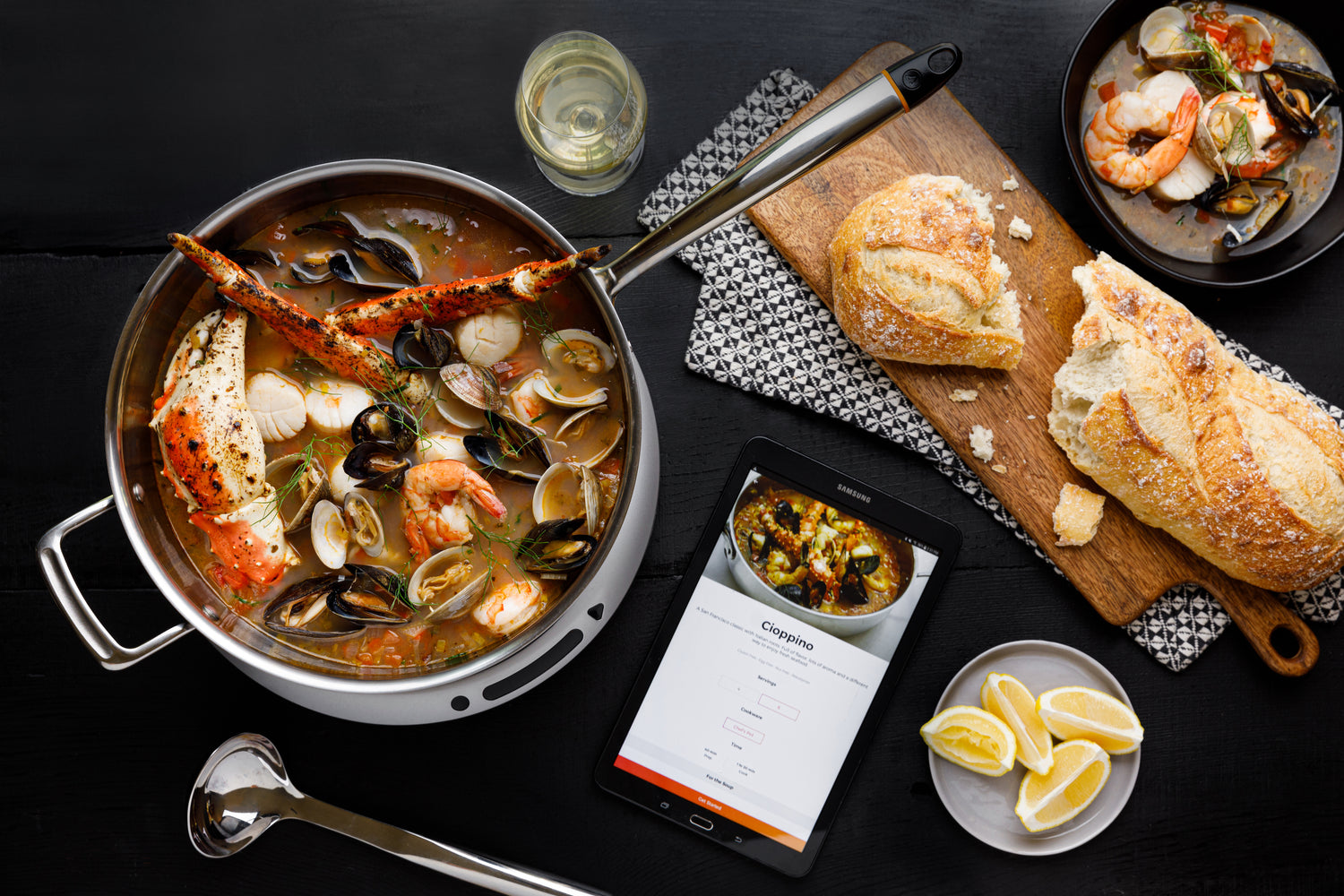 Cooking Cioppino with Hestan Cue Chef's Pot and iPad app, on table top of food
