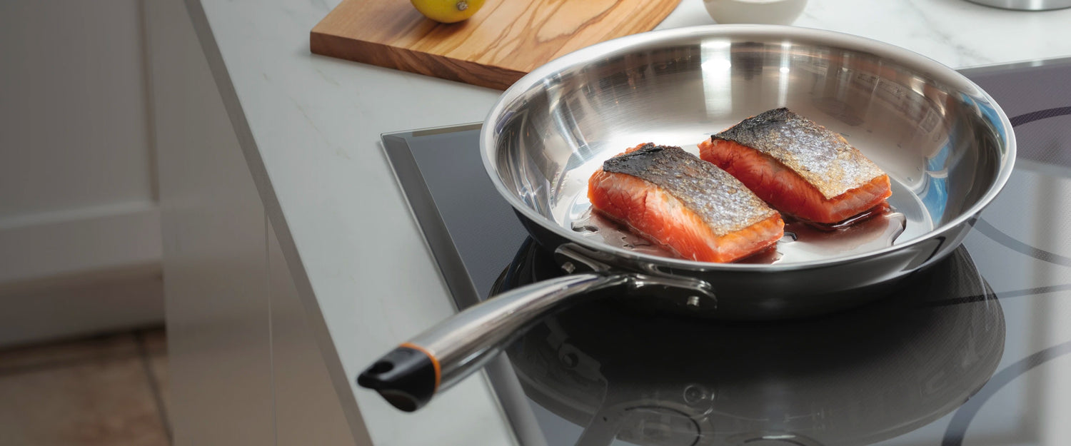 hestan cue pan on GE induction cooktop cooking crispy skin salmon